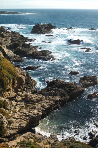 big_sur_rocky_shore_curved_ocean_horizon