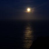 moon_setting_over_the_ocean